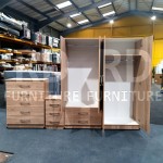 Pre-assembled three-piece set including a classic four-door mirrored wardrobe with two drawers, five-drawer chest, and bedside table set (Oak material).